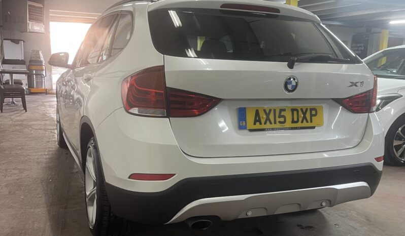 
2015 BMW x1 White SUV full									